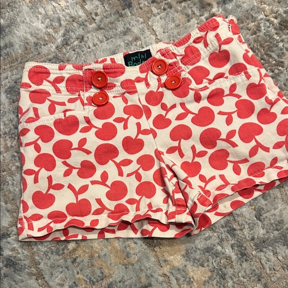 Mini Boden Other - Mini Boden Cream Shorts with Red Apple Print